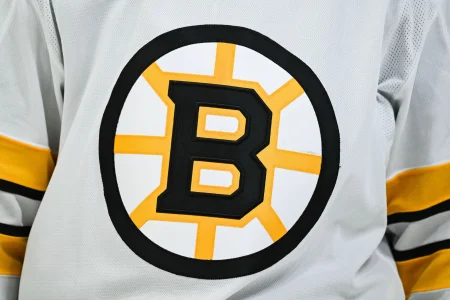 Mar 17, 2026; Montreal, Quebec, CAN; View of a Boston Bruins logo on a jersey worn by a member of the team during the second period at Bell Centre.