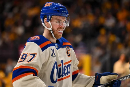 Jan 13, 2026; Nashville, Tennessee, USA; Edmonton Oilers center Connor McDavid (97) awaits the face off against the Nashville Predators during the second period at Bridgestone Arena.