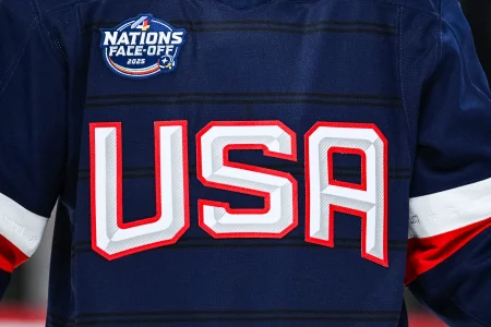 Feb 13, 2025; Montreal, Quebec, CAN; [Imagn Images direct customers only] View of a Team USA logo on a jersey worn by a member of the team during a 4 Nations Face-Off ice hockey game at Bell Centre.