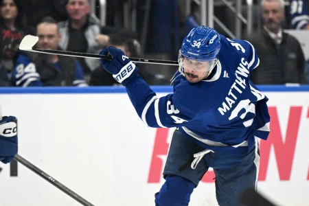 Mar 7, 2026; Toronto, Ontario, CAN; Toronto Maple Leafs forward Auston Matthews (34) shoots the puck against the Tampa Bay Lightning in the third period at Scotiabank Arena.