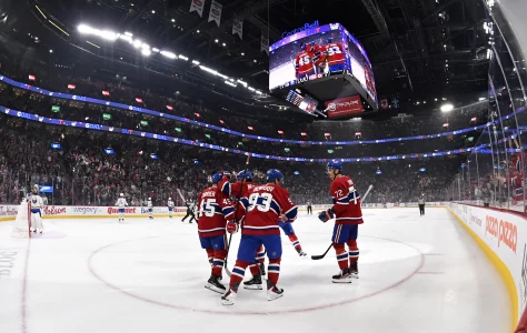 Oct 20, 2025; Montreal, Quebec, CAN;Montreal Canadiens forward Oliver Kapanen (91) celebrates with teammates including forward Ivan Demidov (93) after scoring a goal against the Buffalo Sabres during the first period at the Bell Centre.