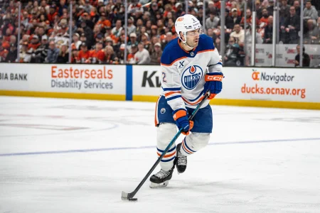 Apr 26, 2026; Anaheim, California, USA; Edmonton Oilers defenseman Evan Bouchard (2) skates with puck during the first period against the Anaheim Ducks in game four of the first round of the 2026 Stanley Cup Playoffs at Honda Center.