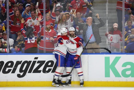 May 8, 2026; Buffalo, New York, USA; Montréal Canadiens defenseman Alexandre Carrier (45) celebrates his goal with center Phillip Danault (24) during the third period against the Buffalo Sabres in game two of the second round of the 2026 Stanley Cup Playoffs at KeyBank Center.