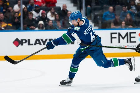 Apr 14, 2026; Vancouver, British Columbia, CAN; Vancouver Canucks forward Elias Pettersson (40) shoots against the Los Angeles Kings in the third period at Rogers Arena.