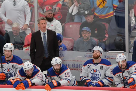 Jun 12, 2025; Sunrise, Florida, USA; Edmonton Oilers head coach Kris Knoblauch looks on during the third period against the Florida Panthers in game four of the 2025 Stanley Cup Final at Amerant Bank Arena.