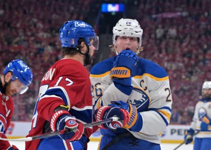 May 12, 2026; Montreal, Quebec, CAN; Montreal Canadiens forward Josh Anderson (17) lloks at Buffalo Sabres defenseman Rasmus Dahlin (26)after Dahlin complains of getting a high stick and a cut during the second period in game four of the second round of the 2026 Stanley Cup Playoffs at Bell Centre.