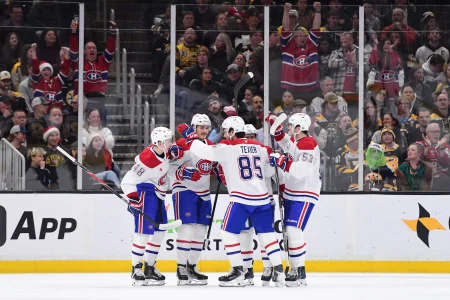 Dec 23, 2025; Boston, Massachusetts, USA; Montreal Canadians forward Sammy Blais (27) celebrates his goal with his teammates during the first period against the Boston Bruins at TD Garden.
