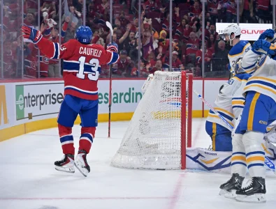 May 12, 2026; Montreal, Quebec, CAN; Montreal Canadiens forward Cole Caufield (13) celebrates after scoring a goal against Buffalo Sabres goalie Ukko-Pekka Luukkonen (1) during the first period in game four of the second round of the 2026 Stanley Cup Playoffs at Bell Centre.
