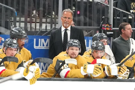 Mar 30, 2026; Las Vegas, Nevada, USA; Vegas Golden Knights head coach John Tortorella watches play between the Golden Knights and Vancouver Canucks during the first period at T-Mobile Arena.
