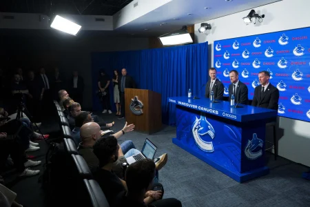 May 14, 2026; Vancouver, BC, Canada; The Vancouver Canucks promoted Henrik Sedin (left), his twin brother Daniel Sedin (center) to co-presidents and Ryan Johnson (right) was named the Canucks new general manger during a press conference at Rogers Arena.