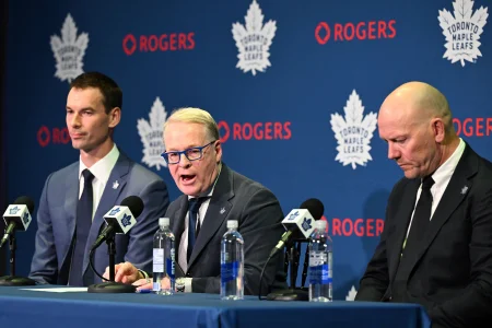 May 4, 2026; Toronto, Ontario, CANADA; Maple Leafs Sports and Entertainment CEO Keith Pelley answers media questions between Toronto Maple Leafs general manager John Chayka (left) and senior executive advisor Mats Sundin during an introductory news conference at Real Sports Bar and Grill.
