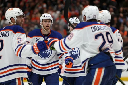 Apr 24, 2026; Anaheim, California, USA; Edmonton Oilers center Connor McDavid (second from left) celebrates with teammates after scoring a a power play goal during the third period against the Anaheim Ducks in game three of the first round of the 2026 Stanley Cup Playoffs at Honda Center.