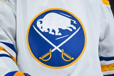 Dec 17, 2024; Montreal, Quebec, CAN; View of a Buffalo Sabres logo on a jersey worn by a member of the team during the second period at Bell Centre.
