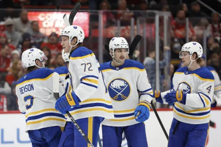 Dec 14, 2024; Washington, District of Columbia, USA; Buffalo Sabres center Jiri Kulich (20) celebrates with teammates after scoring a goal against the Washington Capitals in the second period at Capital One Arena.