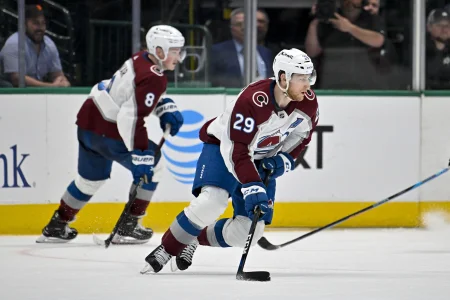 Mar 4, 2023; Dallas, Texas, USA; Colorado Avalanche center Nathan MacKinnon (29) and defenseman Cale Makar (8) in action during the game between the Dallas Stars and the Colorado Avalanche at the American Airlines Center.
