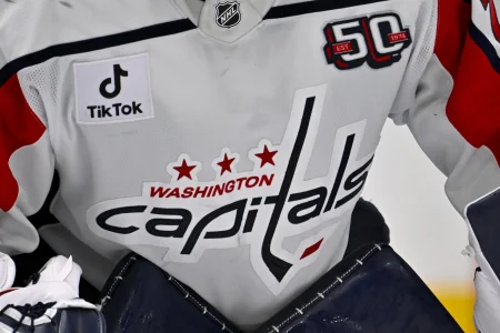 Dec 16, 2024; Dallas, Texas, USA; A view of the Capitals logo on the jersey of Washington Capitals goaltender Charlie Lindgren (79) during the game between the Dallas Stars and the Washington Capitals at American Airlines Center.