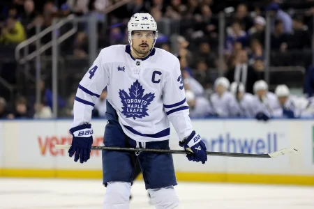 Feb 25, 2026; Tampa, Florida, USA; Toronto Maple Leafs forward Auston Matthews (34) handles the puck against Tampa Bay Lightning during the third period at Benchmark International Arena.
