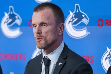 May 14, 2026; Vancouver, BC, Canada; The Vancouver Canucks promoted Henrik Sedin (left) to co-president during a press conference at Rogers Arena.
