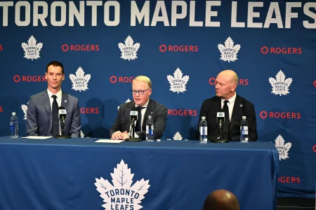 May 4, 2026; Toronto, Ontario, CANADA; Maple Leafs Sports and Entertainment CEO Keith Pelley answers media questions between Toronto Maple Leafs general manager John Chayka (left) and senior executive advisor Mats Sundin during an introductory news conference at Real Sports Bar and Grill.