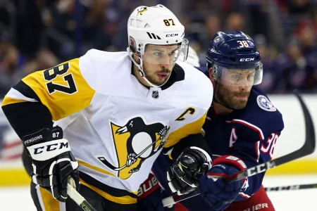 Feb 18, 2018; Columbus, OH, USA; Pittsburgh Penguins center Sidney Crosby (87) skates against Columbus Blue Jackets center Boone Jenner (38) in the second period at Nationwide Arena.