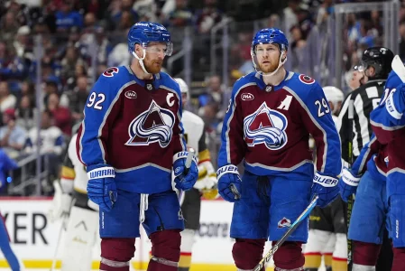 May 22, 2026; Denver, Colorado, USA; Colorado Avalanche left wing Gabriel Landeskog (92) and center Nathan MacKinnon (29) react following a Vegas Golden Knights goal during the third period of game two of the Western Conference Final of the 2026 Stanley Cup Playoffs at Ball Arena.