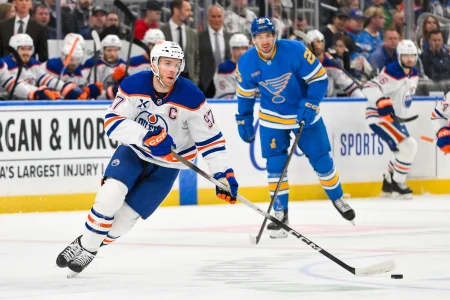 Mar 13, 2026; St. Louis, Missouri, USA; Edmonton Oilers center Connor McDavid (97) controls the puck against the St. Louis Blues during the first period at Enterprise Center.