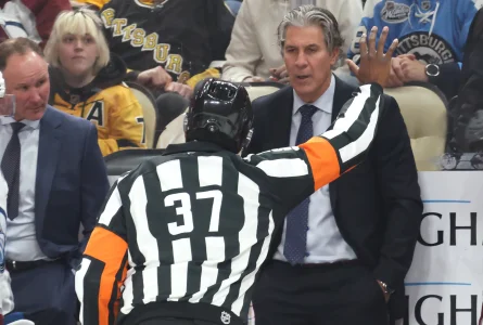 Mar 24, 2026; Pittsburgh, Pennsylvania, USA; Colorado Avalanche head. Coach Jared Bednar (right) asks referee Jordan Samuels-Thomas (37) to review a goal by the Pittsburgh Penguins during the second period at PPG Paints Arena.