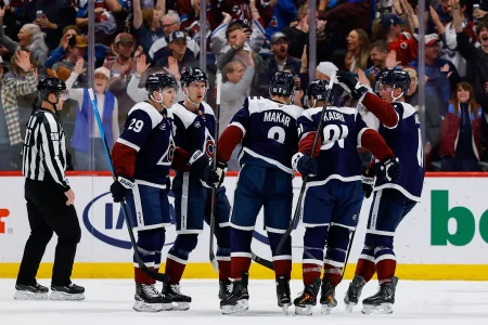 Mar 18, 2026; Denver, Colorado, USA; Colorado Avalanche defenseman Cale Makar (8) celebrates his goal with center Nathan MacKinnon (29) and center Martin Necas (88) and center Brock Nelson (11) and center Nazem Kadri (91) in the first period against the Dallas Stars at Ball Arena.