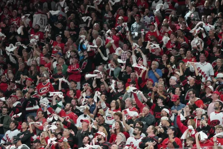 May 21, 2026; Raleigh, North Carolina, USA; Carolina Hurricanes fans cheer after a goal during the first period against the Montreal Canadiens in game one of the Eastern Conferene Final of the 2026 Stanley Cup Playoffs at Lenovo Center.