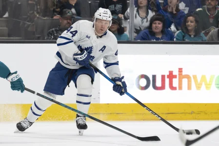Apr 2, 2026; San Jose, California, USA; Toronto Maple Leafs defenseman Morgan Rielly (44) looks to pass the puck during the first period against the San Jose Sharks at SAP Center at San Jose.