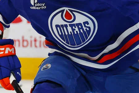 Jan 20, 2026; Edmonton, Alberta, CAN; Edmonton Oilers forward Issac Howard (53) chases a loose puck against the New Jersey Devils at Rogers Place.