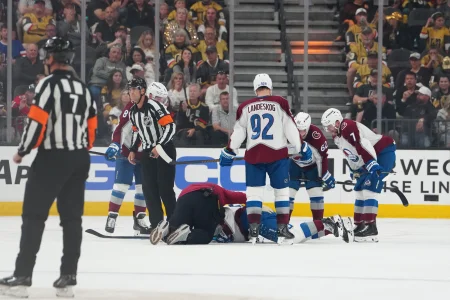 May 24, 2026; Las Vegas, Nevada, USA; Colorado Avalanche center Nathan MacKinnon (29) receives medical during the second period against the Vegas Golden Knights in game three of the Western Conference Final of the 2026 Stanley Cup Playoffs at T-Mobile Arena.