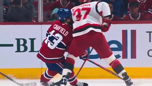 Andrei Svechnikov hit on Cole Caufield