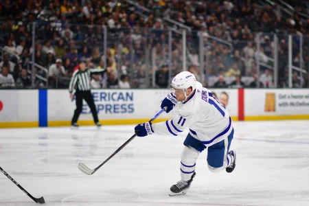 Apr 4, 2026; Los Angeles, California, USA; Toronto Maple Leafs center Max Domi (11) shoots on goal against the Los Angeles Kings during the third period at Crypto.com Arena.