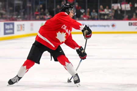 Jan 5, 2026; St. Paul, Minnesota, USA; Canada forward Gavin McKenna (9) makes a pass against Finland during the second period in the third place game of the 2026 IIHF World Junior Championship ice hockey tournament at Grand Casino Arena. :