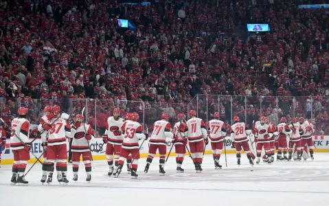 May 25, 2026; Montreal, Quebec, CAN; Carolina Hurricanes players celebrate after winning game three of the Eastern Conference Final of the 2026 Stanley Cup Playoffs against the Montreal Canadiens at Bell Centre.