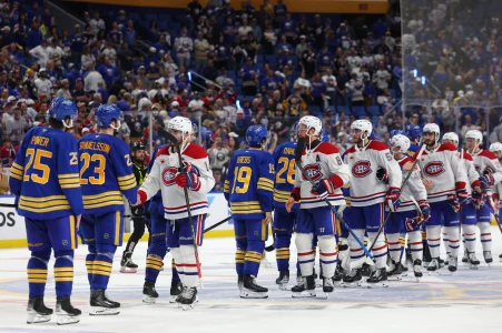 May 18, 2026; Buffalo, New York, USA; The Montréal Canadiens win in overtime and shake hands with the Buffalo Sabres in game seven of the second round of the 2026 Stanley Cup Playoffs at KeyBank Center.