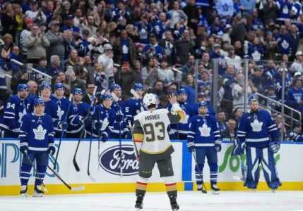 Jan 23, 2026; Toronto, Ontario, CAN; Vegas Golden Knights right wing Mitch Marner (93) acknowledges the crowd after a video board tribute during a TV timeout against the Toronto Maple Leafs in the first period at Scotiabank Arena. Mandatory Credit: Nick Turchiaro-Imagn Images