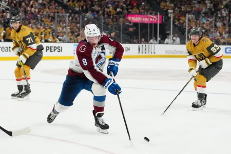 May 26, 2026; Las Vegas, Nevada, USA; Colorado Avalanche defenseman Cale Makar (8) controls the puck during the second period against the Vegas Golden Knights in game four of the Western Conference Final of the 2026 Stanley Cup Playoffs at T-Mobile Arena.
