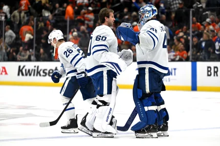 Mar 30, 2026; Anaheim, California, USA; Toronto Maple Leafs goaltender Joseph Woll (60) and Toronto Maple Leafs goaltender Anthony Stolarz (41) celebrate after the game against the Anaheim Ducks at Honda Center.