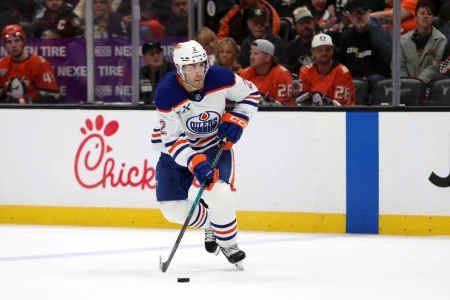 Apr 24, 2026; Anaheim, California, USA; Edmonton Oilers defenseman Evan Bouchard (2) skates with the puck during the third period against the Anaheim Ducks in game three of the first round of the 2026 Stanley Cup Playoffs at Honda Center.