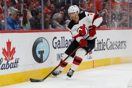 Apr 11, 2026; Detroit, Michigan, USA; New Jersey Devils defenseman Dougie Hamilton (7) skates with the puck in the second period against the Detroit Red Wings at Little Caesars Arena. Mandatory Credit: Rick Osentoski-Imagn Images