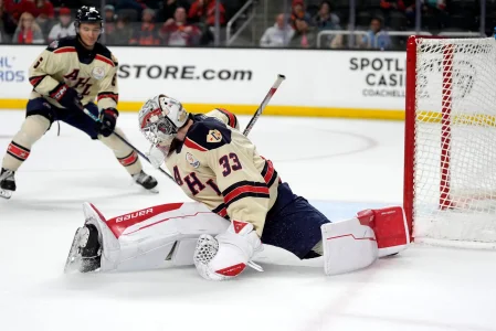 Grand Rapids goaltender Sebastian Cossa (33) defends during the second night of the AHL All-Star Challenge at Acrisure Arena in Palm Desert, Calif., on Monday, Feb. 3, 2025.