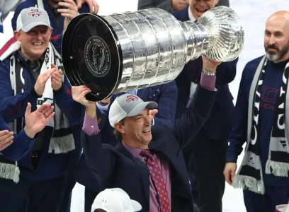 Jun 26, 2022; Tampa, Florida, USA; Colorado Avalanche general manager Joe Sakic celebrates with the Stanley Cup trophy after defeating the Tampa Bay Lightning during game six of the 2022 Stanley Cup Final at Amalie Arena.