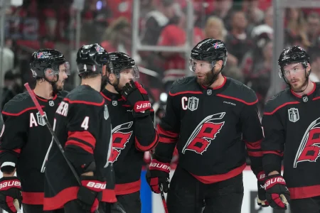 Jun 2, 2026; Raleigh, North Carolina, USA; Carolina Hurricanes center Jordan Staal (11) talks with teammaes during the third period against the Vegas Golden Knights in game one of the 2026 Stanley Cup Final at Lenovo Center.