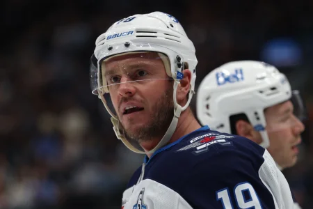 Apr 14, 2026; Salt Lake City, Utah, USA; Winnipeg Jets center Jonathan Toews (19) reacts after a play against the Utah Mammoth during the third period at Delta Center.