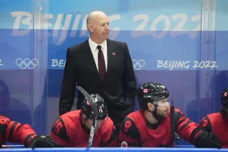 Feb 12, 2022; Beijing, China; Team Canada head coach Claude Julien against Team USA during the third period in the mens ice hockey preliminary round of the Beijing 2022 Olympic Winter Games at National Indoor Stadium.