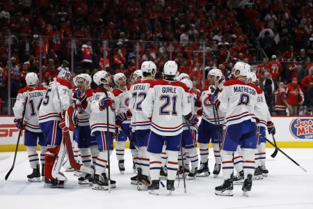 May 3, 2026; Tampa, Florida, USA; the Montreal Canadiens bench celebrates forward Nick Suzuki (14)s opening goal against the Tampa Bay Lightning during the first period in game seven of the first round of the 2026 Stanley Cup Playoffs at Benchmark International Arena.