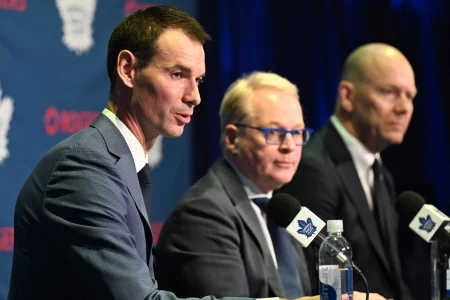 May 4, 2026; Toronto, Ontario, CANADA; Toronto Maple Leafs general manager John Chayka answers media questions beside Maple Leafs Sports and Entertainment CEO Keith Pelley and senior executive advisor Mats Sundin during an introductory news conference at Real Sports Bar and Grill.