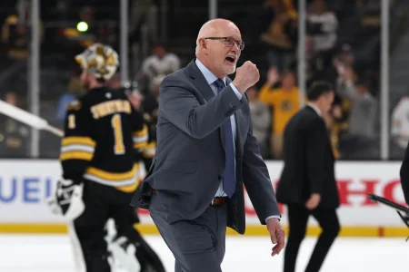 May 1, 2026; Boston, Massachusetts, USA; Buffalo Sabres head coach Lindy Ruff pumps his fist after their 4-1 win over the Boston Bruins in game six of the first round of the 2026 Stanley Cup Playoffs at TD Garden.